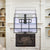 MantelMount MM540 tv mount over a cream colored fireplace with illustration to show pull down motion.