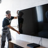 How to Move a Wall-Mounted TV to a New Spot